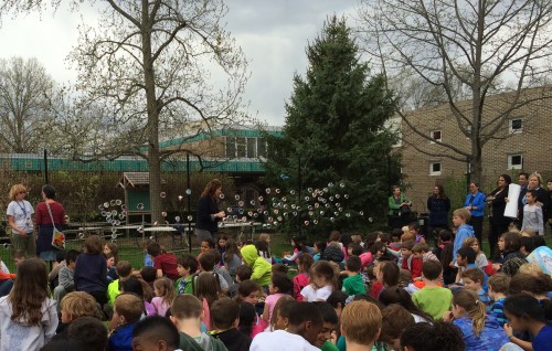 Priscilla Hayes, CP garden educator, presented plants to the garden's founders.