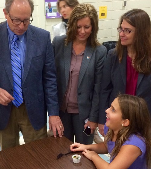 From left, NJDA Secretary Doug Fisher; Rose Tricario, director of NJDA Division of Food and Nutrition; Princeton Mayor and PPS parent Liz Lempert; and a student with a sample portion of broccoli leaf slaw.