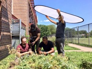 PSGC men in garden with chickpea plants