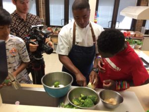 students preparing vegetables
