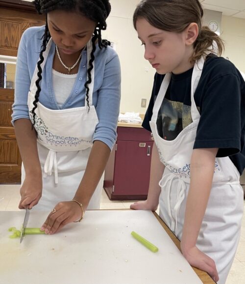 Working on knife skills in the teaching kitchen