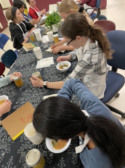 Students eating DIY soup together